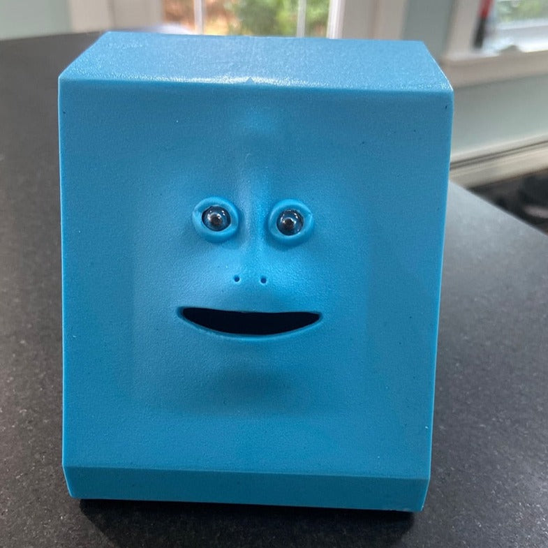Human Face Eating Coin Banks
